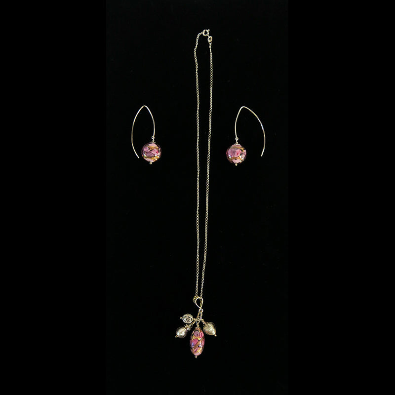 pink and gold earrings and necklace