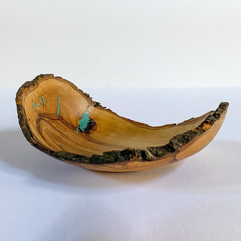 wood bowl that is curved