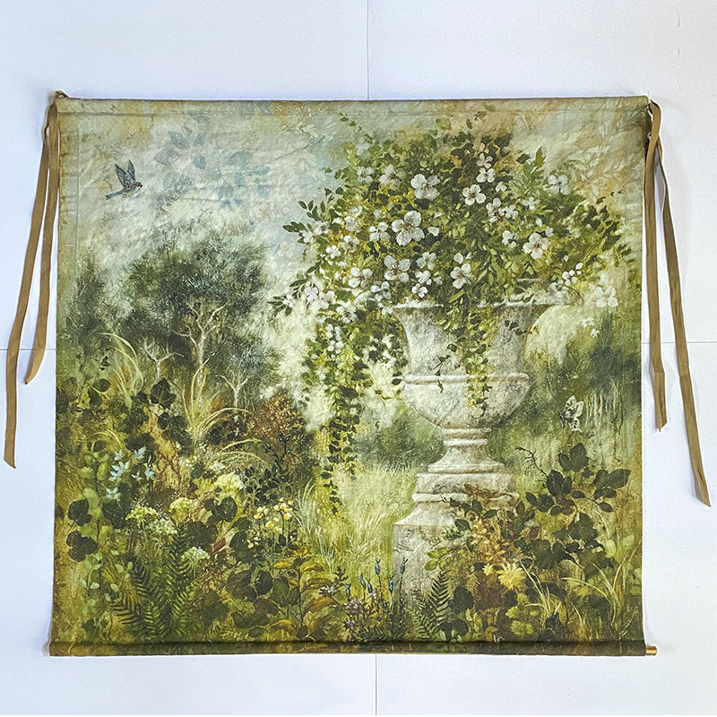 tapestry with scene of garden and flying bird