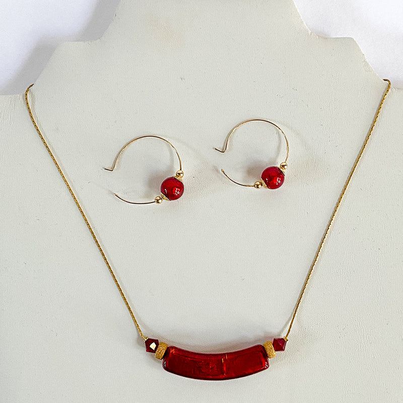 red and gold earrings and necklace